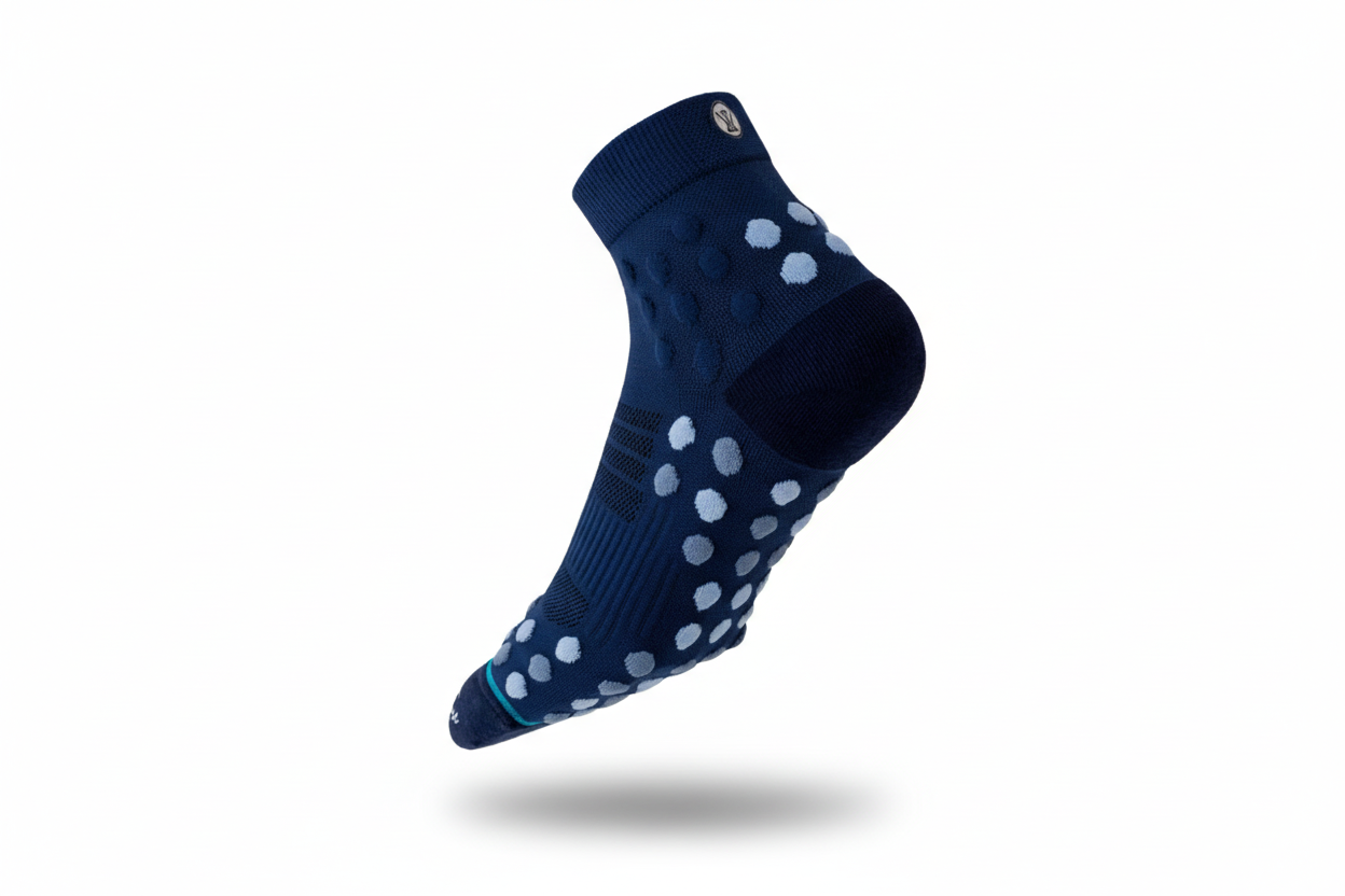 Running grip socks with knitted traction knots for superior grip